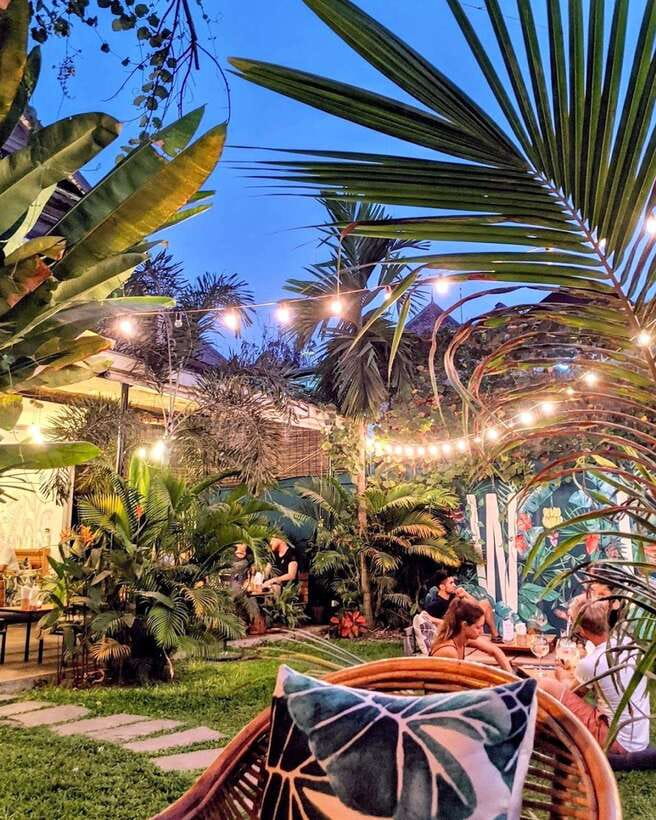 Phnom Penh's Ultimate Street Food Tour by Tuk Tuk - Bassac Lane: cocktails in a garden setting