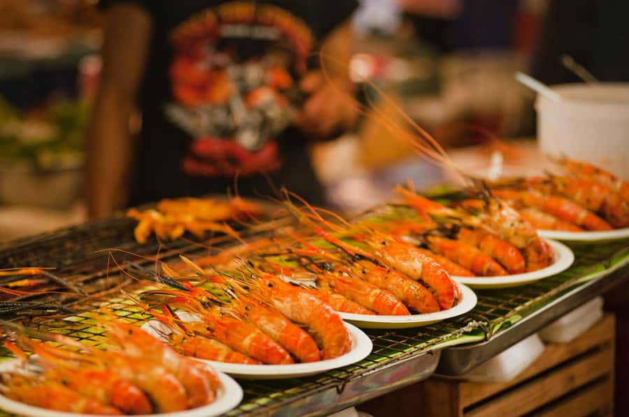 Phuket: Sunset View and Seafood Market Dinner Guided Tour - A local restaurant meal built around your choices