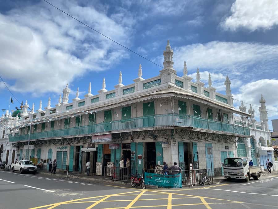 Port Louis: Private Guided Tour and Street Food Tasting - Caudan Waterfront: shops, cafés, and a modern finish