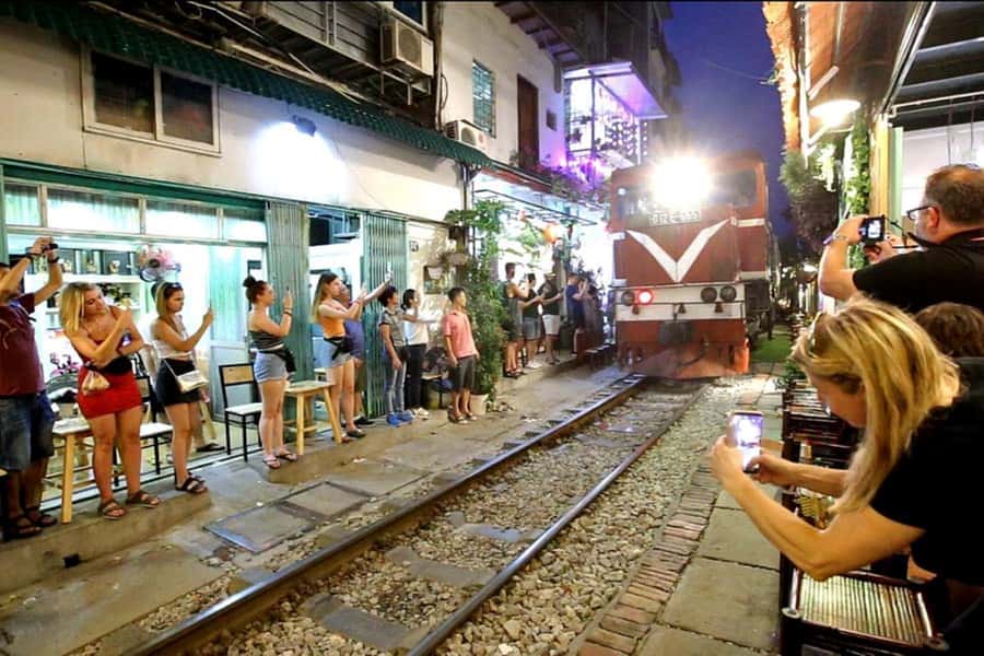 Private: Hanoi Street Food Exploration and Train Street Trip - Tiny stools and real street-side atmosphere