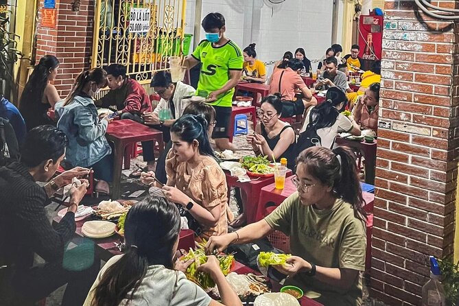 Private Street Food Tour by Motorbike/Car with Local Students - Banh mi from a long-running local stop