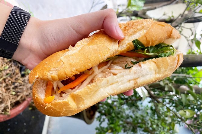 Private Street Food Tour by Scooter in Ho Chi Minh City - Ho Thi Ky Flower Market is the tour’s strongest local stop