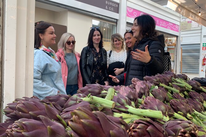 Rome: Street Food, Local Market and Hidden Gems Tour - Crossing Ponte Testaccio
