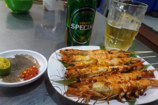 Saigon After Dark and Street Food by Motorbike and Scooter - The flower market and District 5 after dark