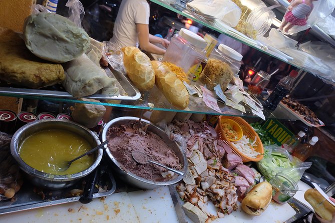 Saigon After Dark and Street Food by Motorbike and Scooter - The practical side of riding through Ho Chi Minh City