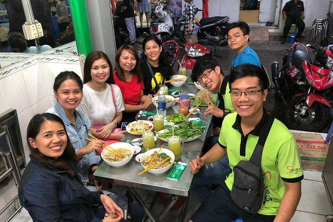 Saigon By Night and Street Food By Motorbike | Opt: Ao Dai Riders - Nguyen Van Cu Bridge and the Saigon River at night