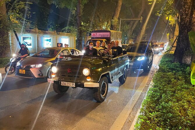 Saigon By Night Open Air Jeep Street Food Tour Experience - Crossing into District 4 for Vinh Khanh Street seafood