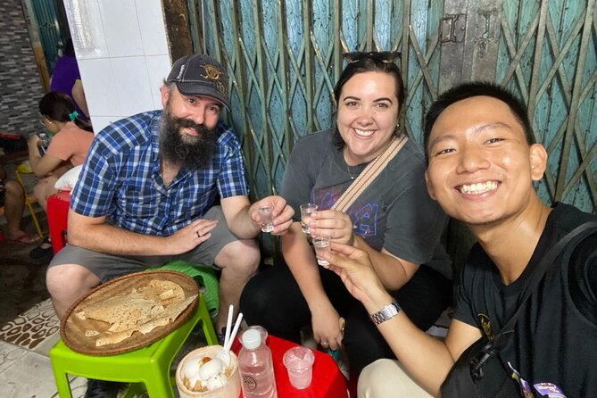 Saigon by Night: Private Street Food Walk You Can’t Miss - Everyday evening life in District 3