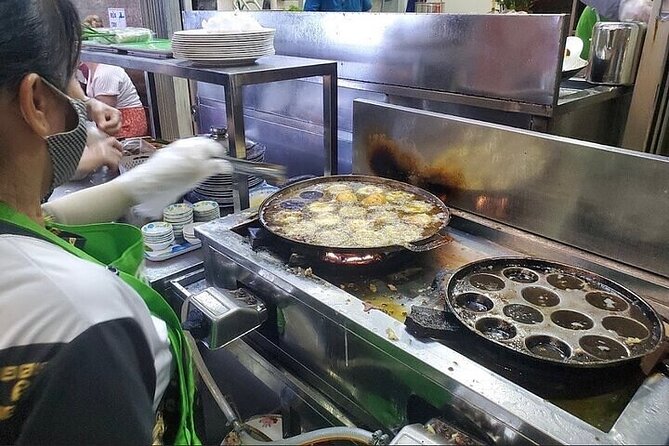 Saigon Evening Walking Street Food Tour - Bún bò and the noodle stop in the central food alleys