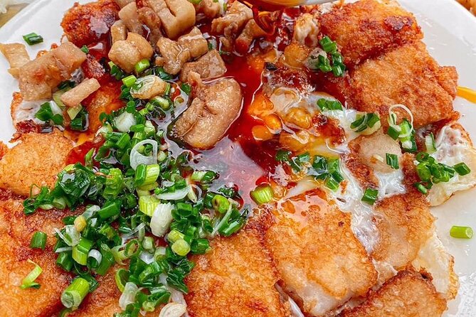 Saigon Evening Walking Street Food Tour - Bánh mì, steamed rice rolls, and Vietnamese sausages