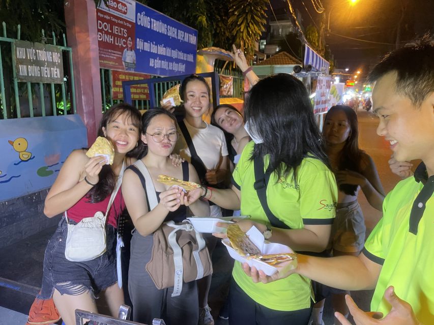 Saigon: Night Sightseeing And Street Food Tour By Vespa - Crossing into District 4 for the famous bread