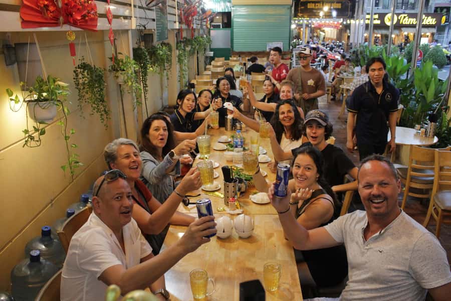 Saigon: Street Food Discovery & Local Culinary Journey - Grilled rice paper, skewers, and seafood at the market