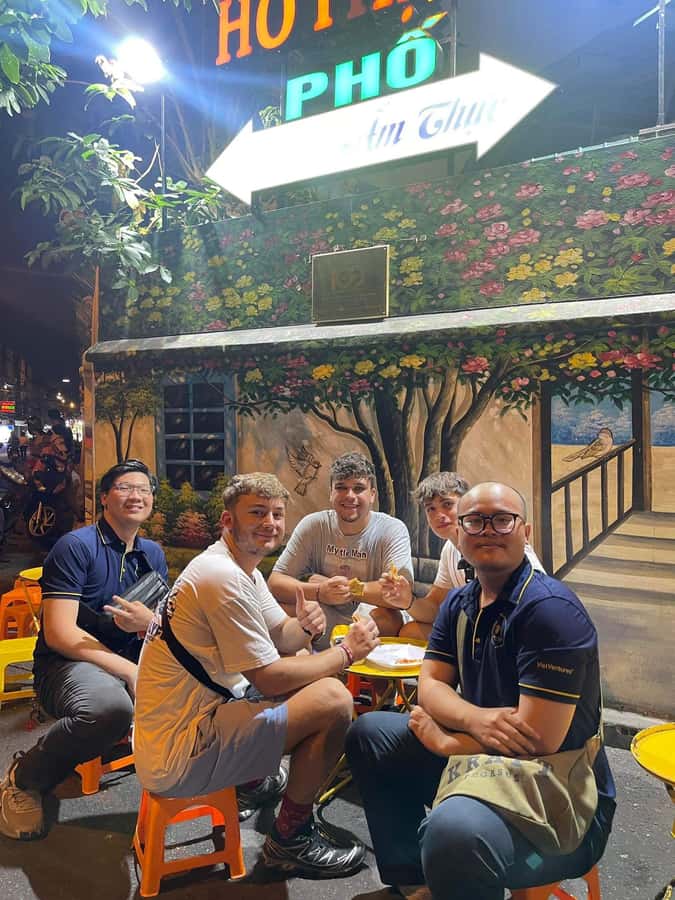 Saigon: Street Food Discovery & Local Culinary Journey - Finishing with custard, drinks, and a city view