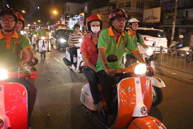 Saigon Vespa By Night Street Food Tour 4,5 Hours - Riding through Ho Chi Minh City at night
