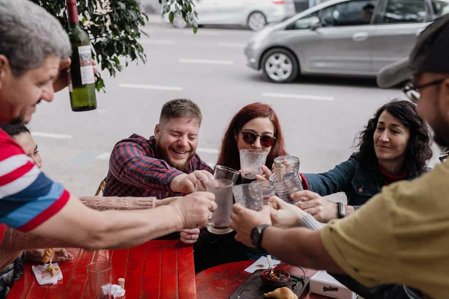 San Telmo: Historical Guided Tour with Street Food & Drinks - Walking through the San Telmo Market