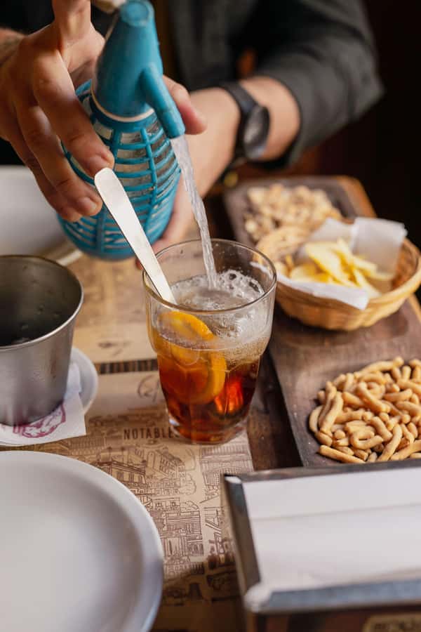 San Telmo: Historical Guided Tour with Street Food & Drinks - Ending with an Argentine dessert
