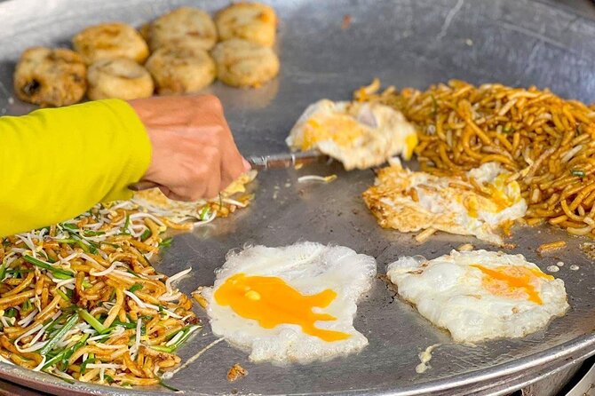 Siem Reap: Local Street Food Experience by Tuk-Tuk - Num Banh-Chok brings a classic Cambodian flavor