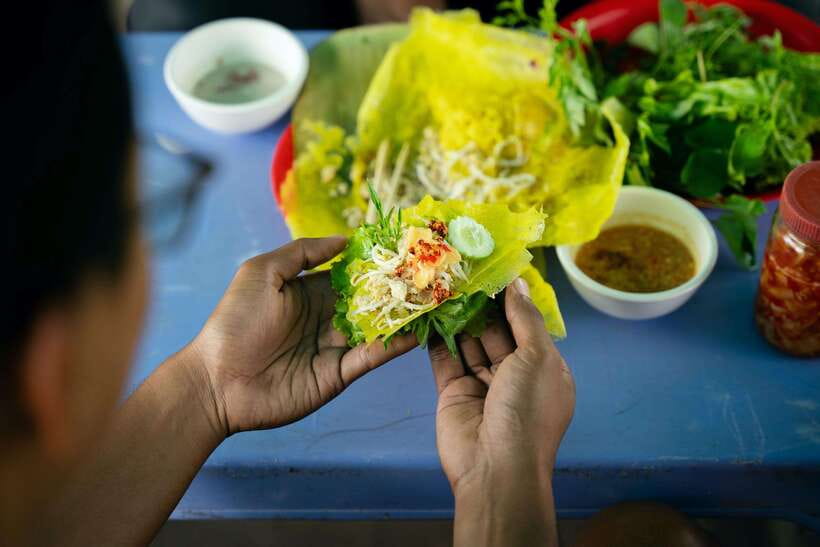 Siem Reap's Ultimate Street Food Tour by Tuk Tuk - Two Cambodian dishes at a family roadside stall