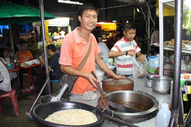 Small-Group Chiang Mai Evening Street Food Tour - Riding a songthaew through Chiang Mai