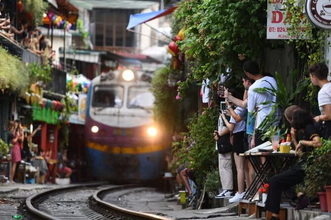 Small group Hanoi Street Food Tour with visit Train Street - Hanoi food first, Train Street second