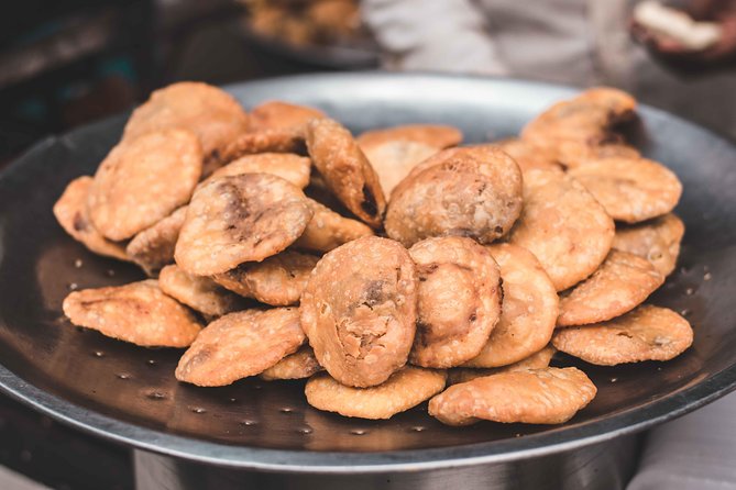 Spice & Stories: 3-Hour Old Delhi Heritage Food Walk Guided Tour - Chandni Chowk, temples, sweets, and street movement