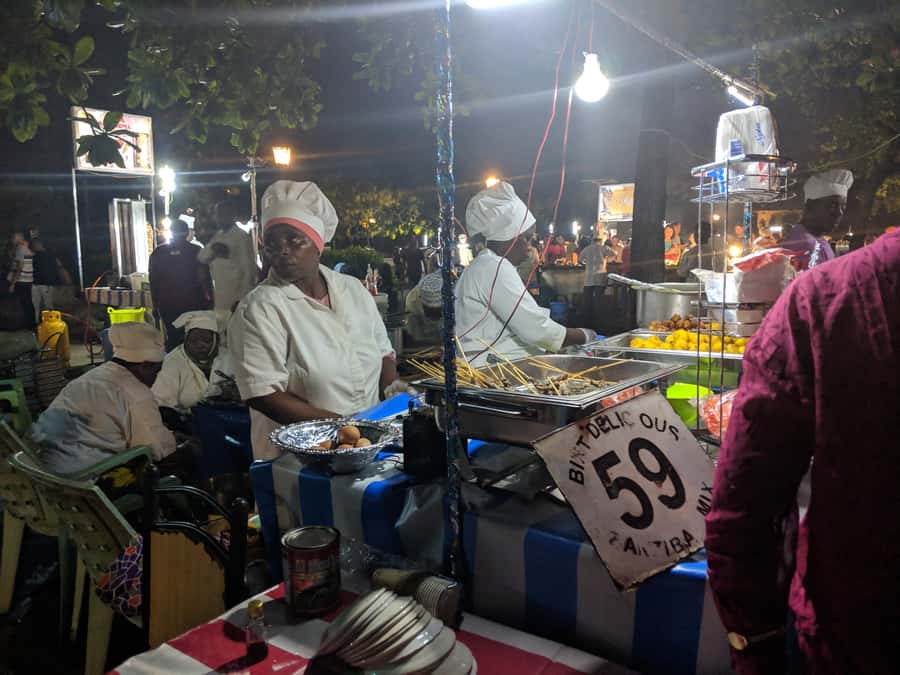 Stonetown: Food Markets and Street Food Walking Tour - Guides, pickup, and the feel of the evening