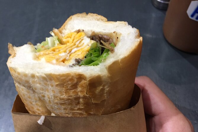 Street food on foot with a local-Asian Promise - Walking between restaurants and street shops