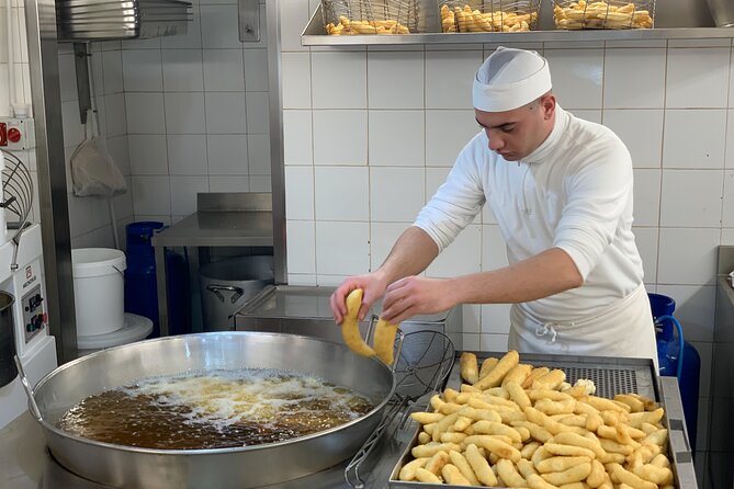 Street food tour of Catania by night - Arancini, fritters, and the reality of Sicilian street food