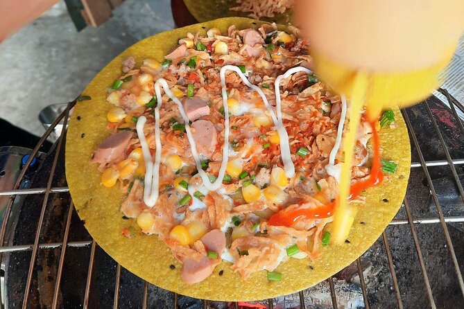 Super Niche Walking Street Food Tour in Ho Chi Minh City - Guides make the busy streets manageable