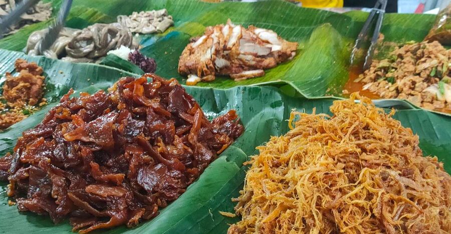 Takua Pa: Food Market, Tsunami Museum, Temple, & Old Town - Reading the modern design at Kong Ka Temple