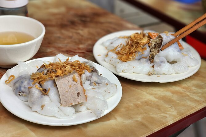 TASTE OF HANOI - walking street food adventure - A banh mi break beside Hang Ma Street