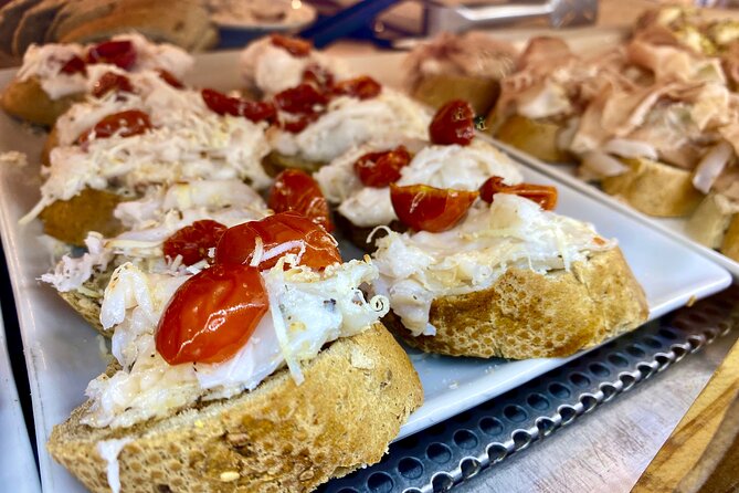 Tasty Street Food Tour of Venice City Center with Cicchetti & Local Specialties - Seven centuries of appetite at Rialto Market