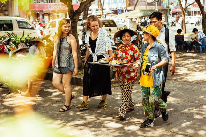 The 10 Tastings of Ho Chi Minh City With Locals: Private Street Food Tour - Turtle Lake shifts the mood from sightseeing to local hangout