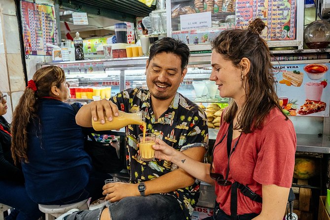 The 10 Tastings of Lima With Locals: Private Street Food Tour - Plaza San Martín and the story of turrón