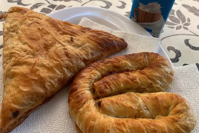 Tirana Guided Street Food Gems Tour (6 dishes, 1 sweet and drink) - The Pyramid and the final sweet
