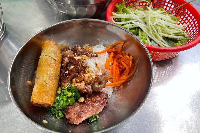Top Notch Street Food Motorbike Tour In Ho Chi Minh City - Ban Co Market and southern beef stew