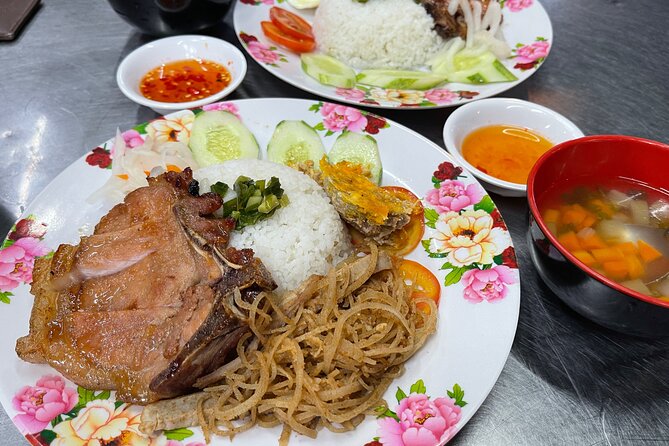 Top Notch Street Food Motorbike Tour In Ho Chi Minh City - Nguyen Thien Thuat apartment buildings and grilled bananas