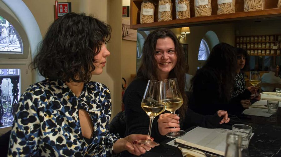 Turin: Aperitivo & Street Food Tour Delights with a Local - First stop: Piedmontese wine and handmade breadsticks