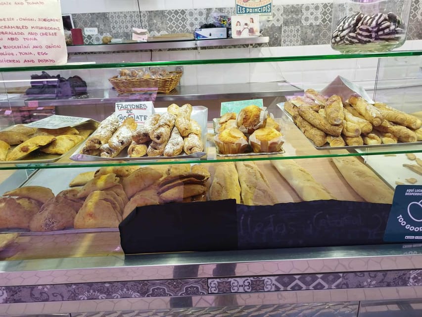 Valencia: Street Food Tour including Paella & Tapas Tasting - The old town in 45 minutes