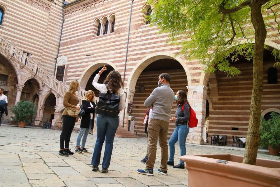 Verona: street food walking tour near the historical center - Piazza Erbe and the heart of old Verona