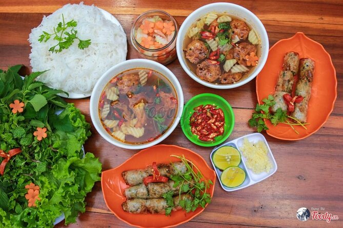 Walking Street Food Tour in Hanoi and Train Street - From Old Quarter lanes to railway tracks